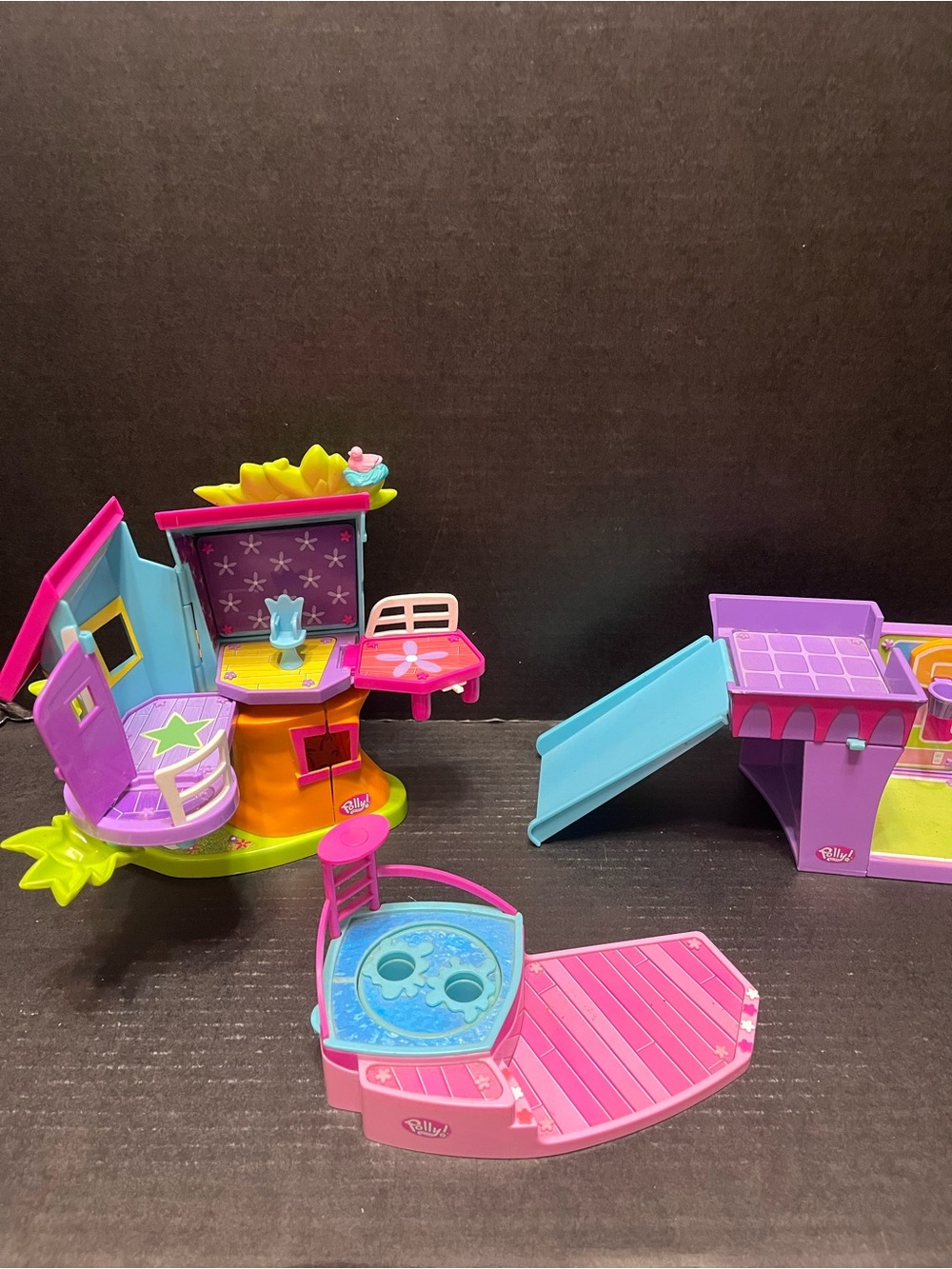Polly Pocket LOT

Figures, purse and pets clamshell
